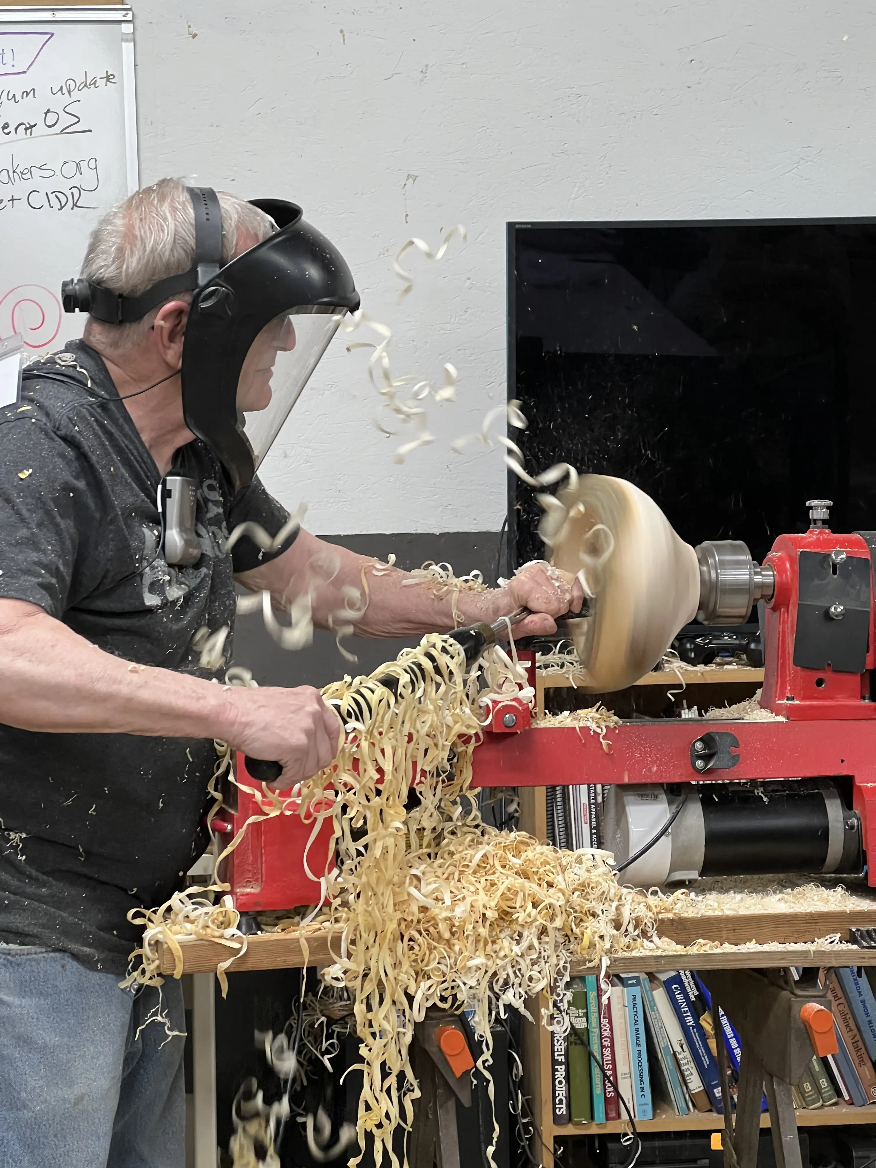 Placeholder image of guild members collaborating in the woodshop
